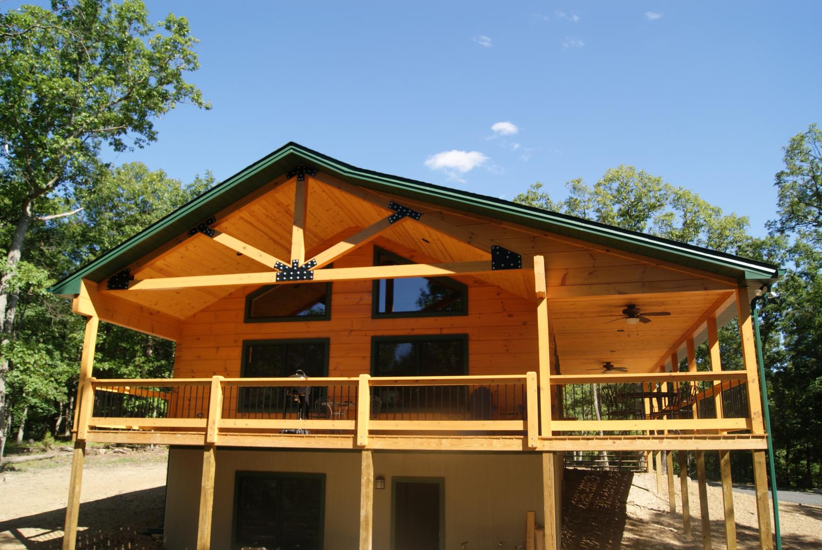 The same porch and gable from further along, the deck running the width of the house