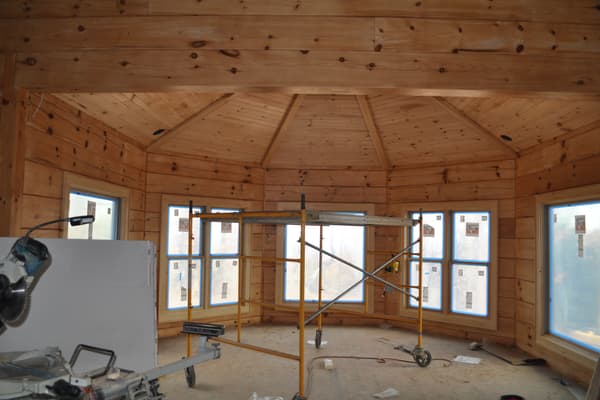 The round room with scaffolding still up, windows in around the curve, light coming from every side.